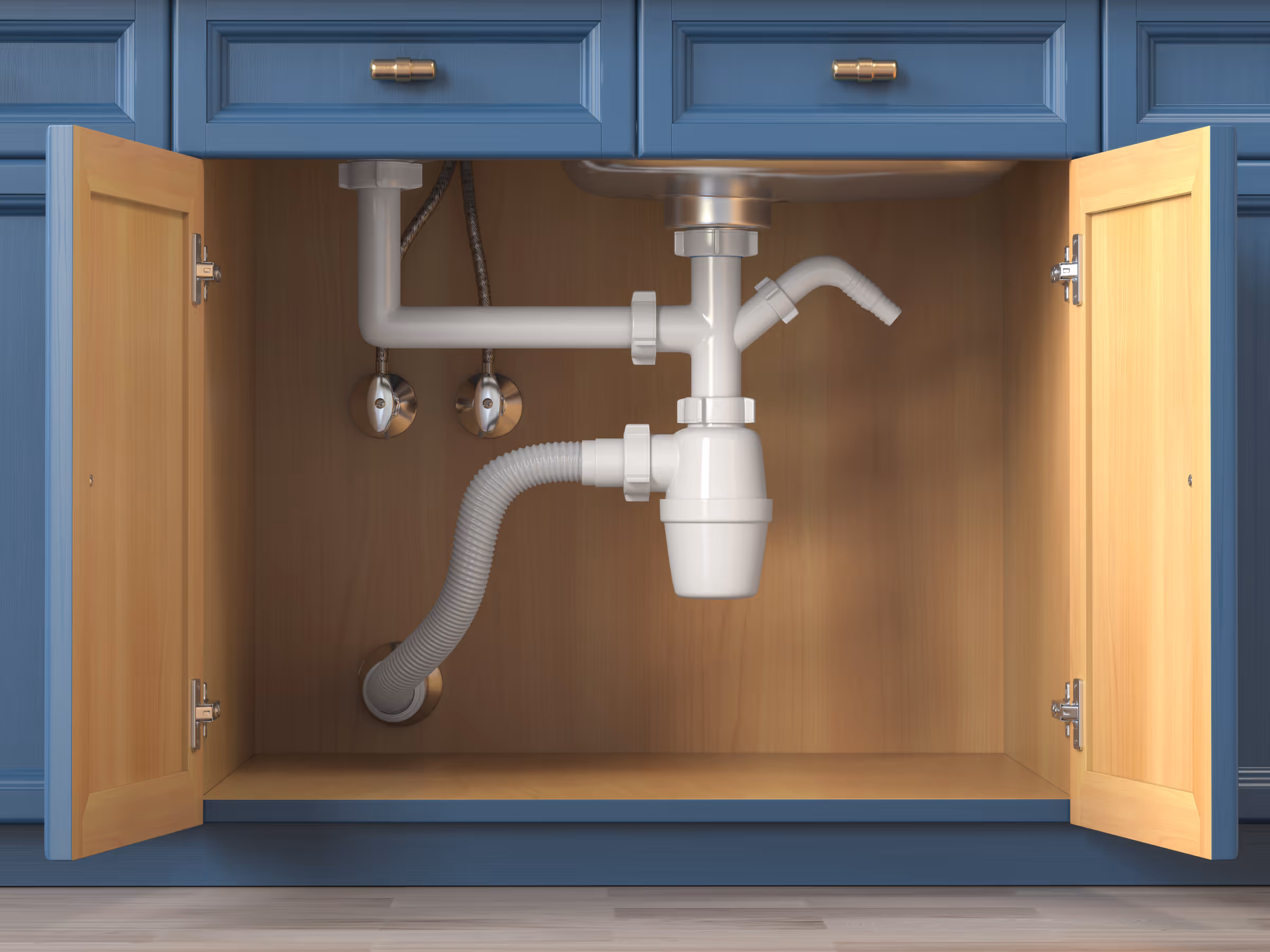 Basement kitchen sink plumbing with drain pipe and water supply connections