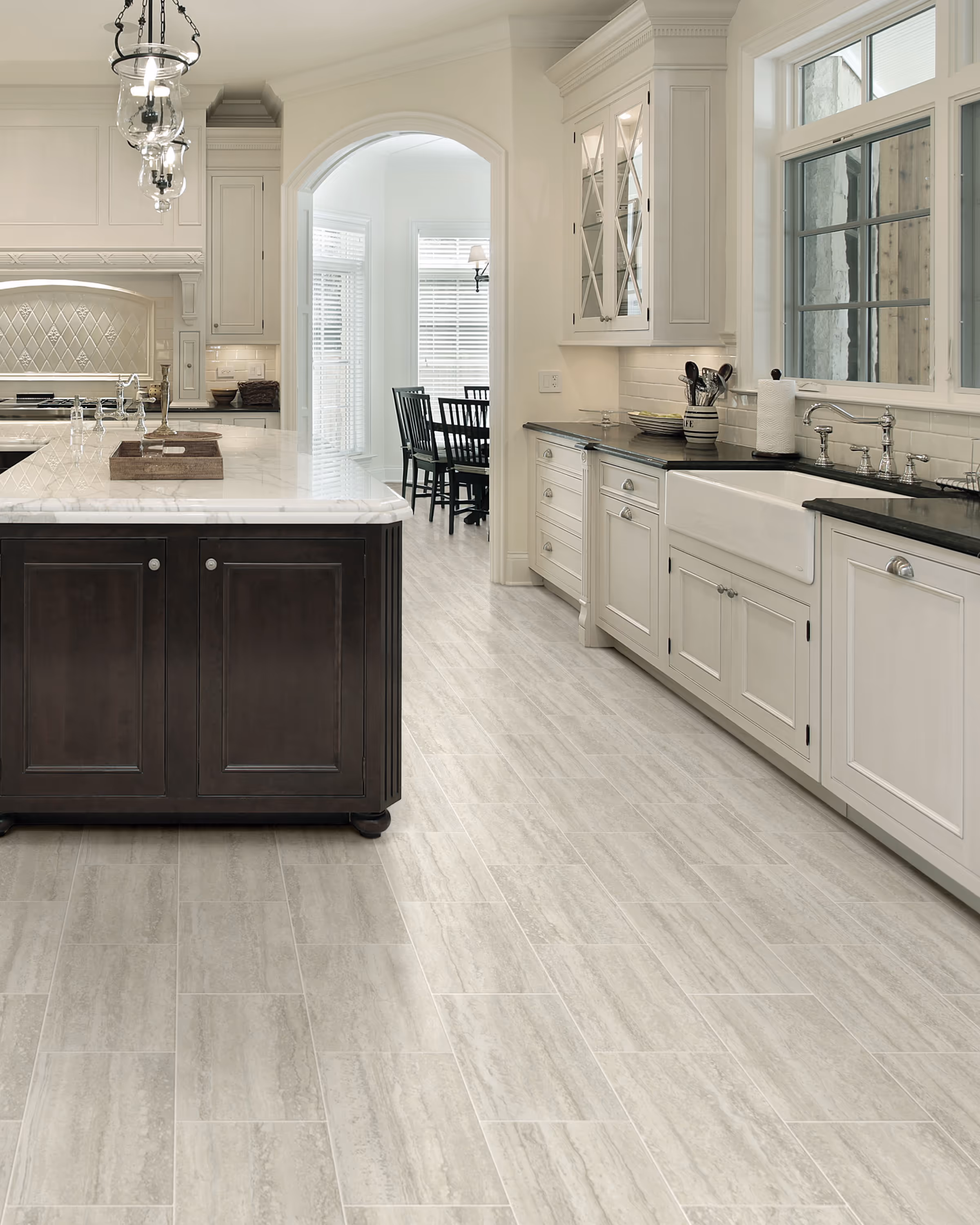 Finished kitchen flooring renovation in Durham Region with modern tile floor