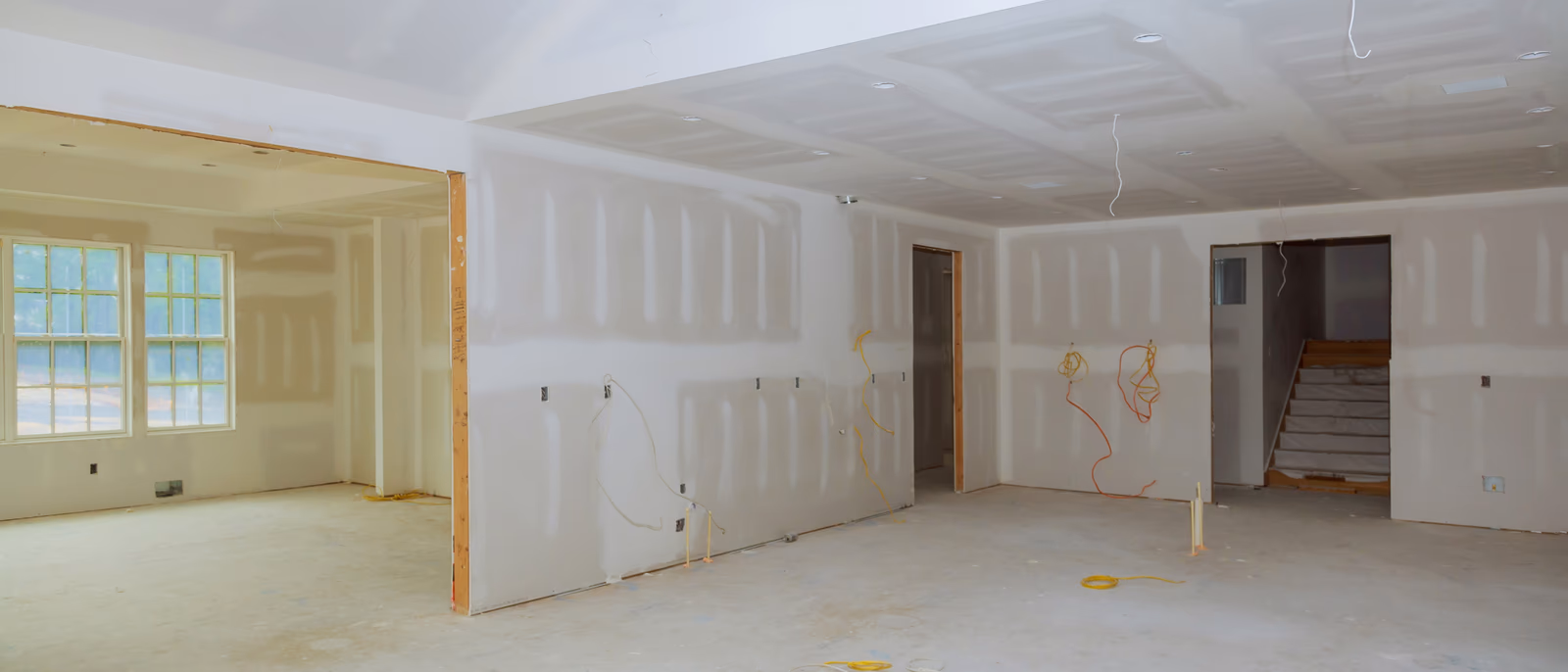 Finished basement drywall installation and finishing during basement renovation