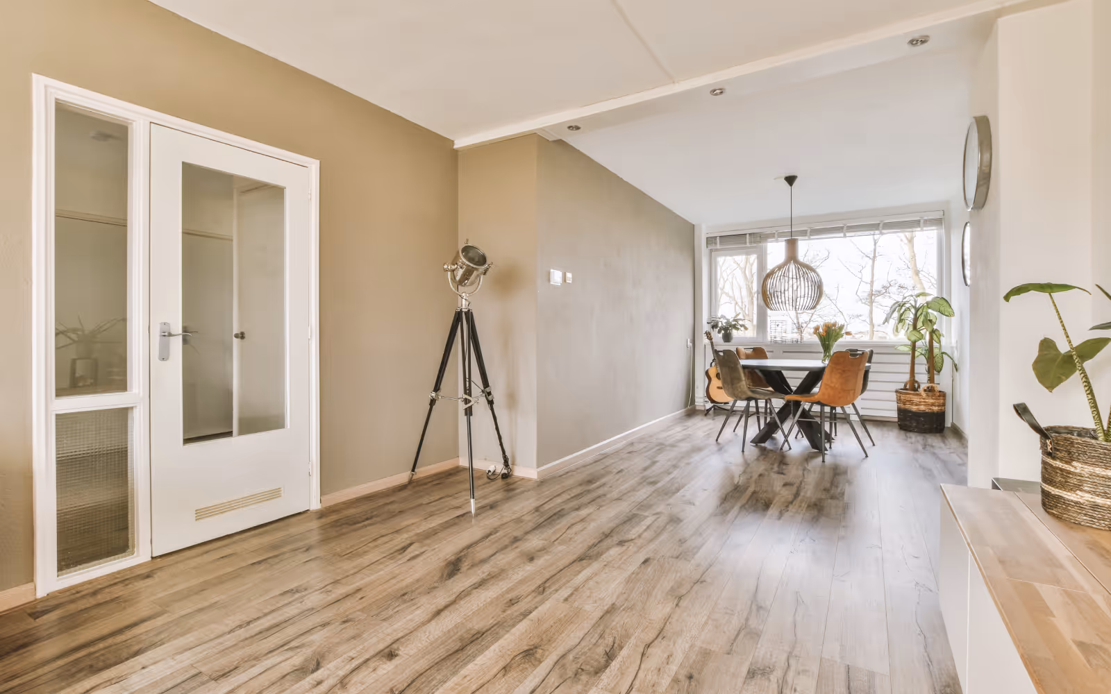 Finished basement with modern vinyl plank flooring installation