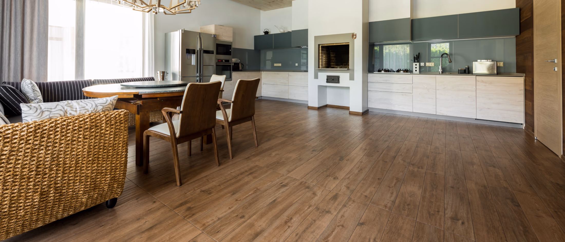 Finished basement remodel with wood look vinyl flooring