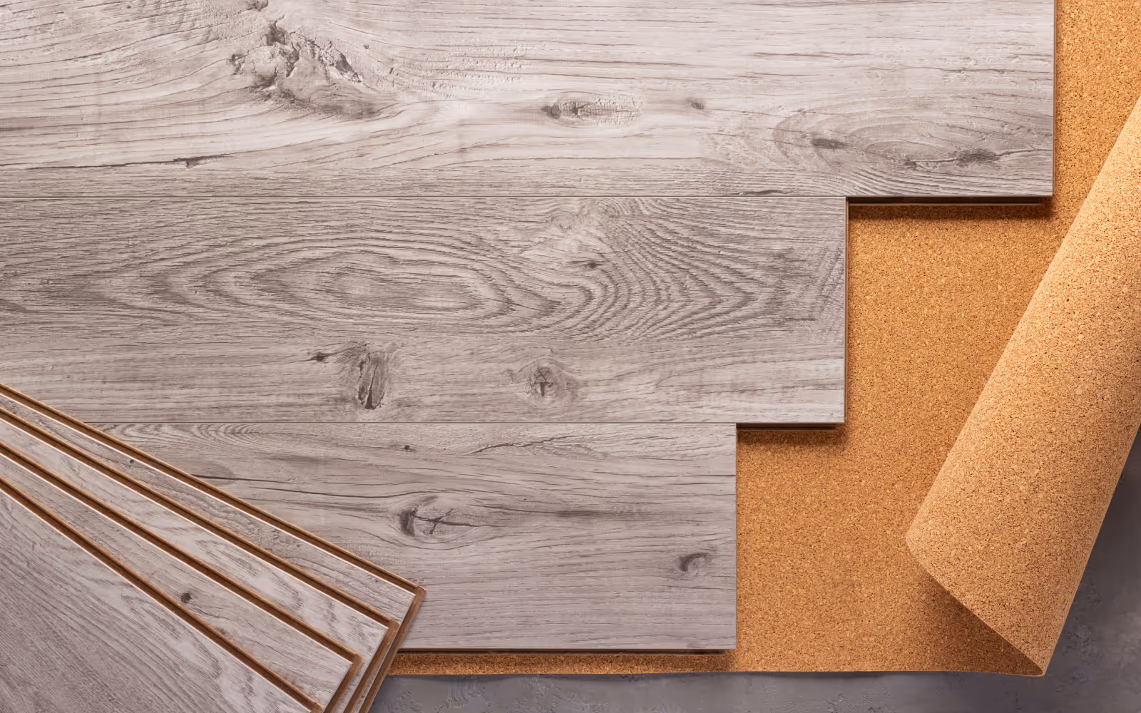 Basement flooring installation with plank flooring and underlayment prepared for moisture control