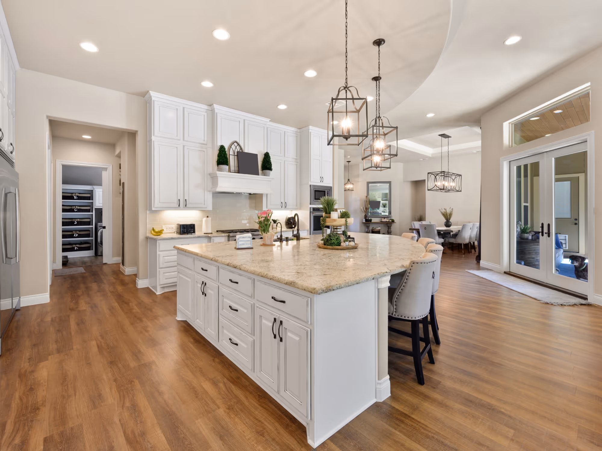 Kitchen remodeling with stone countertops, island seating, and new cabinets in Durham Region