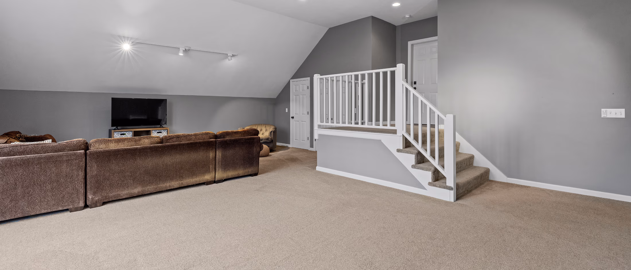 Finished basement with soft carpet flooring installation