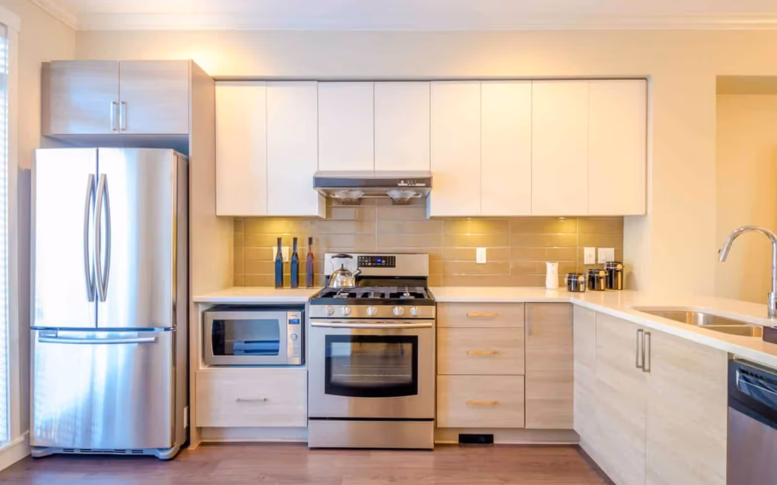 Kitchen appliance installation and cabinet fitting for handyman services in Durham Region