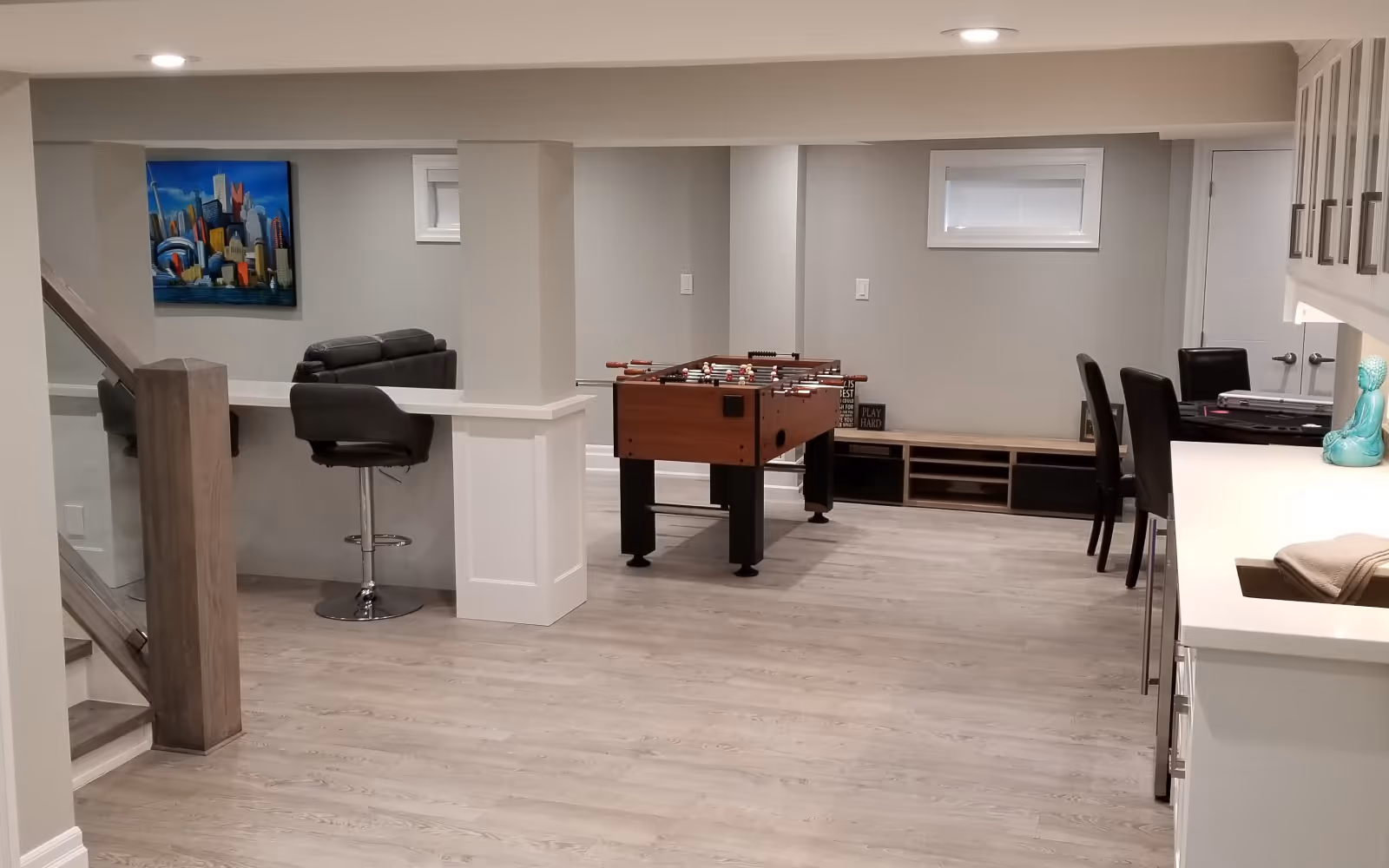 Interior painting and finishing for a renovated basement living space in Durham Region
